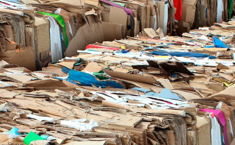 Sorting and reprocessing line for packaging materials